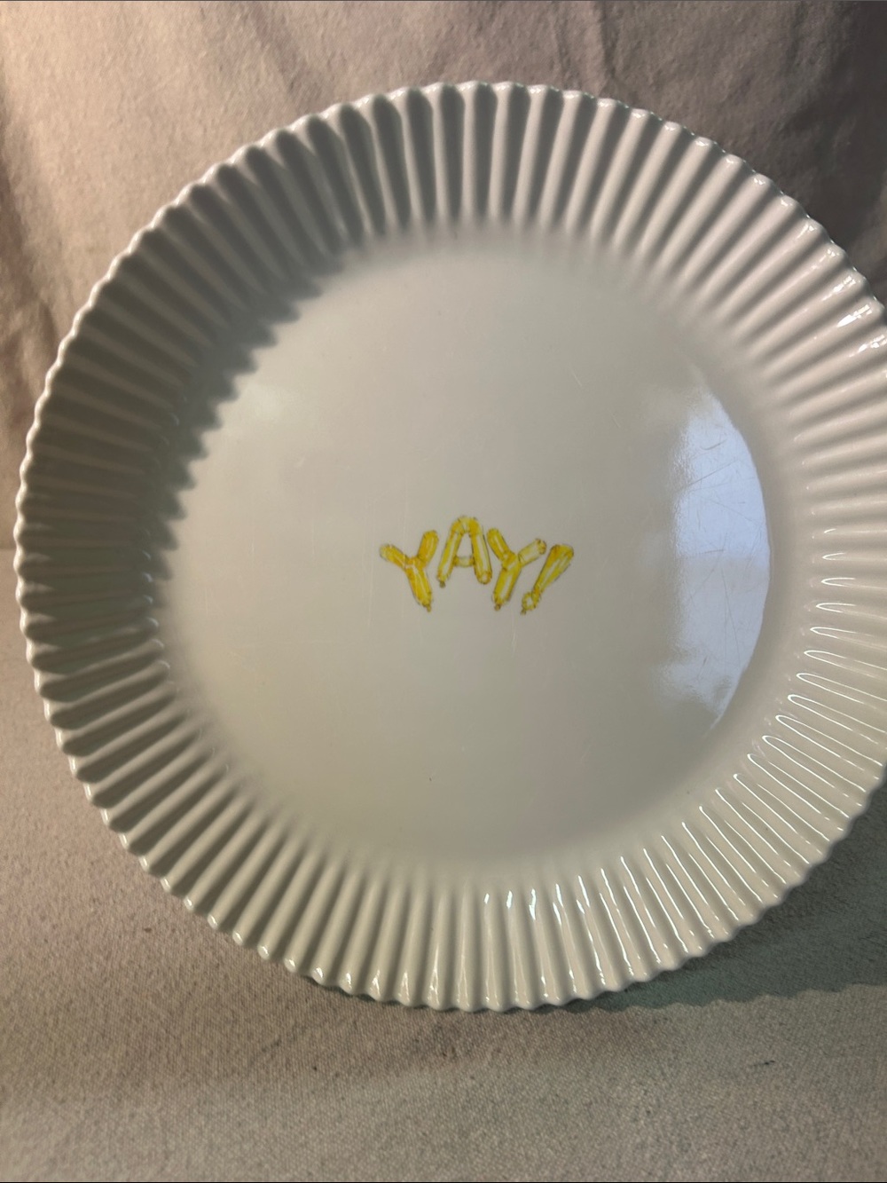 Rae Dunn White Fluted Plate with Yellow "YAY" Accent